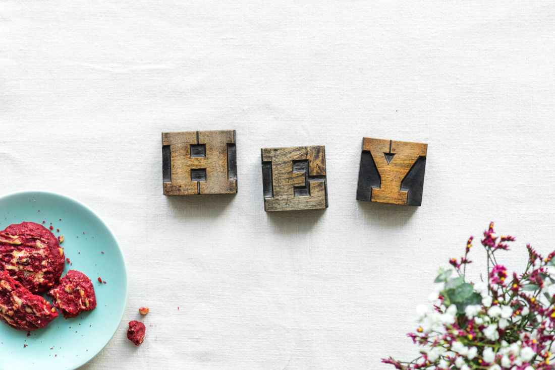 three brown wooden letters wall decor
